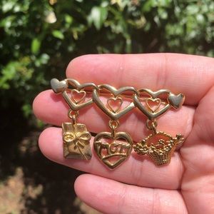 Gold “Mom” brooch
